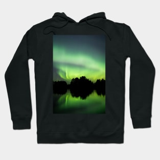 Northern lights glowing over lake in Finland Hoodie